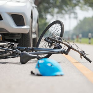 A bicycle lying on the road - Levian Law