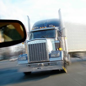 A truck moving along a highway