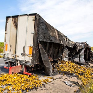 A burnt-out truck on the roadside - Levian Law