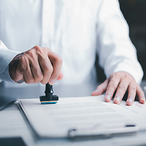 Hand stamping a document, related to proving discriminatory advancement in a California workplace